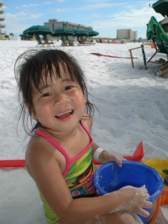 Karis playing in the sand